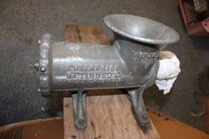 lot 659 image: Vintage Enterprise meat chopper grinder ( attached to board)