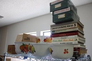 lot 660 image: Kitchen lot recipe books, recipe boxes, and serving bowls