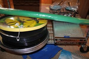lot 820 image: Kitchen serving items platters, hot plate, banana tray, roll of plastic green table cover