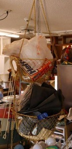 lot 833 image: Hanging metal basket and contents