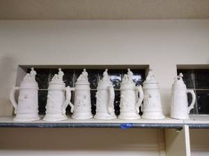 lot 560 image: Unfinished ceramics steins - 7 total