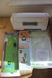 lot 2 image: Cricut machine and accessories as shown