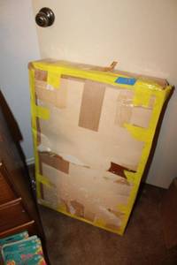 lot 53 image: Sealed box - presumed to be a vintage wedding dress