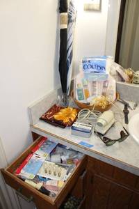 lot 64 image: Misc. lot Vintage sunglasses, umbrellas, nightlights and bulbs, scarf and more
