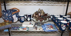 lot 115 image: Blue and white Christmas mugs, baskets, Villeroy & Boch porcelain postcards, and metal Noahs ark