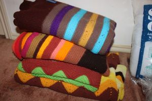 lot 67 image: Handmade Afghan blankets