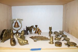lot 93 image: Brass animals, fan and bell