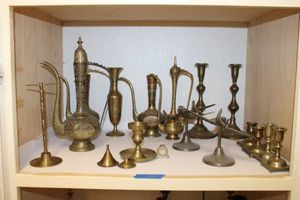 lot 94 image: Brass pitchers, airplanes and candle holders