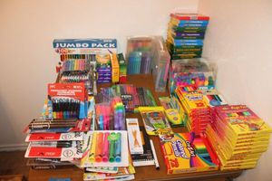 lot 104 image: Generous amount of markers, highlighters, Crayons, and colored pencils