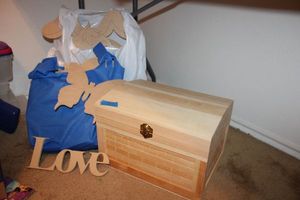 lot 109 image: Unfinished Wood crafts with nesting trunks