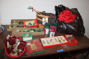 lot 134 image: Christmas ornaments, baskets and poinsettias