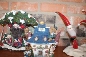 lot 182 image: Christmas decorations village, resin tree and house, light up porcelain angel (working condition unknown)