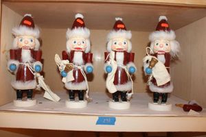 lot 231 image: Nutcrackers - 4 total. Santa design as shown