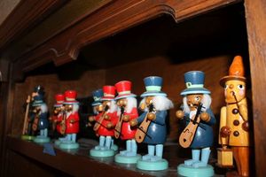 lot 249 image: Wooden smoking dolls