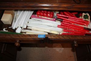 lot 260 image: Red and white candles and more