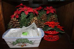 lot 269 image: Christmas table decorations, Lead crystal bells, Christmas loaf pan and cast iron red trivet