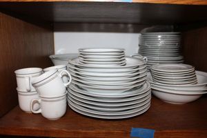 lot 305 image: White MITTERTEICH dish set with gold and black trim, plus SCHUMANN white with gold trim dishes