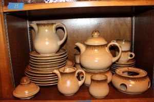 lot 24 image: Pottery dish set with teapots - light brown color