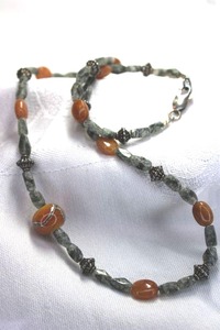lot 346 image: Dendritic clear Quartz tube bead and orange Rhodochrosite or brecciated Jasper bead necklace with Sterling Silver lobster clasp. Marked 925 on clasp. 18L