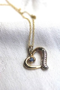 lot 359 image: Sterling Silver Italian vermeil (gold over sterling) open heart pendant with prong set ink blue Quartz on 18L cable chain necklace. Does not test as Sapphire, but Quartz. Marked 925 Italy on clasp.  Pendant marked 925 on reverse.  1.25L approx.