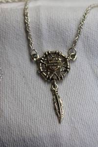 lot 360 image: Signed Harley Davidson logo on dreamcatcher pendant on 16L rope chain necklace. Spring ring clasp. Marked in 3 places 925. Pendant 1.5L