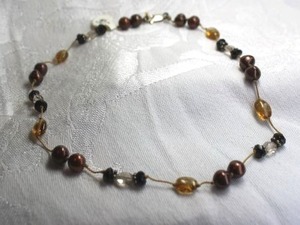 lot 368 image: Sterling Silver and bronze peacock freshwater Pearl station necklace. Marked 925 on clasp. 14L