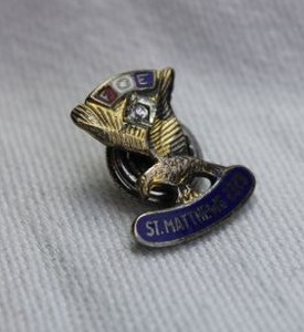 lot 371 image: Sterling Silver and enamel fraternal Order of Eagles lapel pin. FOE St. Mathews Aerie 2379 (Louisville, KY, operated from Jun 1956-Sep 1997). marked Sterling on reverse. Group that placed 10 commandment monuments across America.