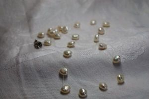 lot 375 image: Sterling Silver freshwater pearl station necklace with sterling clasp. Marked 925 on clasp. 16L