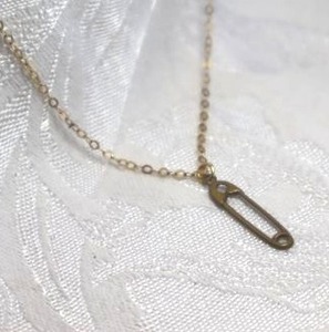 lot 383 image: 14K vintage gold filled necklace with paper clip pendant. (this is a purpose designed pendant, not an actual safety pin). Marked 120 14K GF on spring ring clasp. 18L