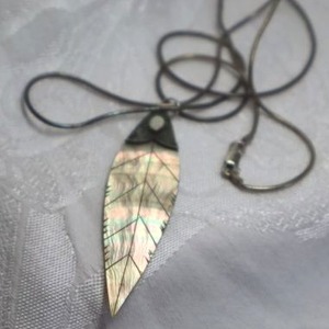 lot 400 image: Sterling Silver 24L snake chain necklace (Marked 925) with sterling silver carved abalone shell pendant (marked 925) decorated with Opal cabochon.