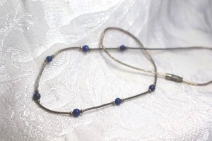 lot 405 image: Sterling Silver liquid bead and round Sodalite gemstone bead station necklace. Barrel clasp. 16L Unmarked.