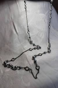 lot 430 image: Classic faux grey pearl and acrylic station bead necklace. Lobster clasp. 32L