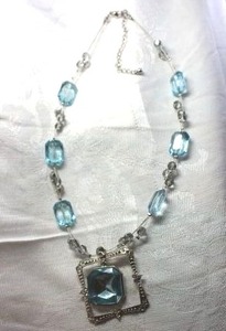 lot 422 image: Silver wire necklace with faceted Swiss blue glass station beads and rhinestone framed pendant, 19L with 3 extender. Lobster clasp.