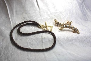 lot 486 image: Woven leather necklace with gold plated and rhinestone accented D-ring toggle clasp. 18L. Includes pair of faceted ear hugger earrings with post  stud and earring clips. 2L