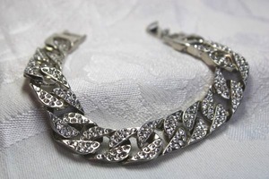 lot 473 image: Cuban link rhinestone decorated bracelet. Fold over clasp. 7.5L