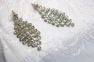 lot 477 image: Metal swedged rhinestone dangle poststud earrings. 2L