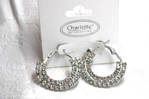 lot 482 image: Rhinestone decorated hoop poststud earrings on Charlotte Accessories branded card. 1.25W