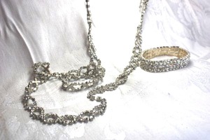 lot 509 image: Incredible swedged tassel necklace with swedged stretch 3-row bracelet set. 36L, Tassel drop 4L. Very nice piece