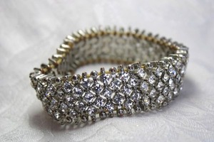 lot 547 image: Vintage thick AB rhinestone stretch statement bracelet. Heavy and .75W