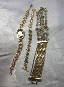 lot 564 image: (3) Gold finish rhinestone and glass bead bracelets. 7L, 7.5L and 7.5-9L