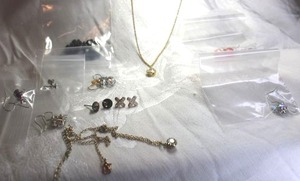 lot 565 image: (9) Rhinestone and crystal earrings. (5) ear wire and (4) poststud. Includes (2) Gold finish rhinestone solitaire pendant necklaces