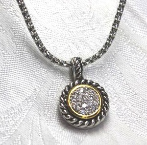 lot 580 image: Silver finish half round chain necklace with gold and silver rhinestone decorated pendant with large bale. Lobster clasp. 16L with 2 extender.