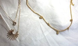 lot 583 image: (2) Gold finish and rhinestone necklaces. 16L with 3 extender and 26L with 5 extender. Lobster clasps.