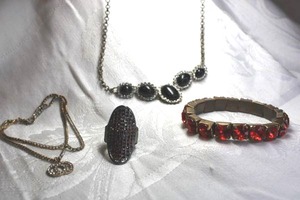 lot 585 image: Rhinestone and crystal jewelry. Includes Necklace, (2) bracelets(one is swedged), Fashion ring.