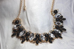 lot 423 image: Chunky clear marquise cut rhinestone glass and round black acrylic half cut beads necklace with gold finish chain necklace. 18L with 4 extender. Lobster clasp.