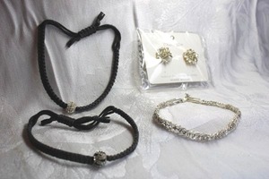 lot 490 image: (2) woven black bracelets with rhinestone beads, rhinestone double row bracelet 7L and rhinestone and black enamel star poststud earrings on card.