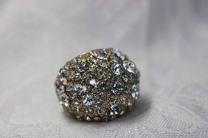 lot 432 image: Large statement rhinestone cluster ring. Size 6. Approx 1W