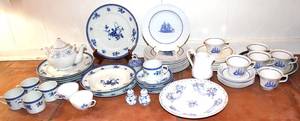 lot 38 image: 55 Pieces of Blue and White Mismatched Dinnerware