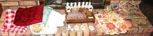 lot 53 image: Large Lot of Table Cloths, Napkin Holders, Silverware Box, Placemats, and Napkins