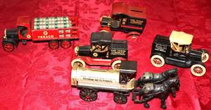 lot 57 image: Lot of Five Cast Iron Vehicle Banks, Four are Texaco, One is Johnson Screw Drivers